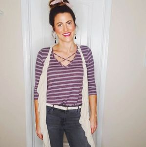 Soft striped top with crisscross neckline.